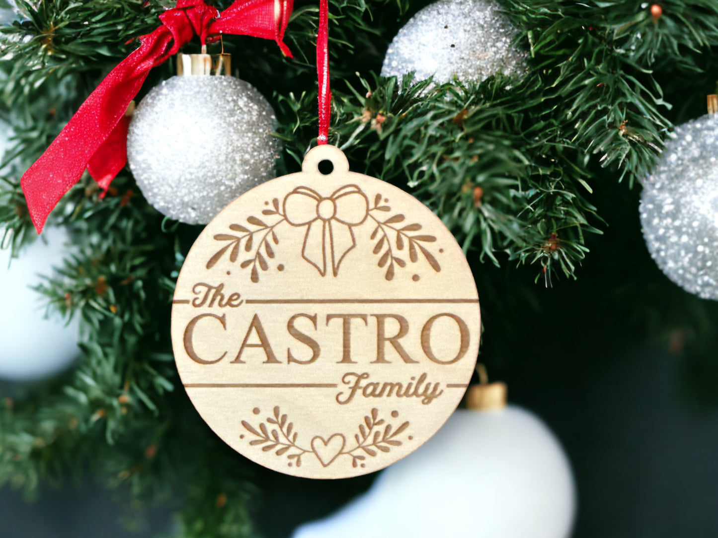 Personalized Baltic Birch Family Name Christmas Bow Ornament - A Customized Holiday Treasure